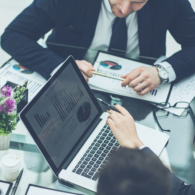 imgi 112 successful business team workplace discussing marketing reports 160672 17107